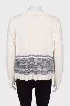 Wool sweater with brooch