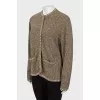 Knitted green jacket with buttons