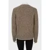 Knitted green jacket with buttons