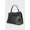 Leather bag with wicker