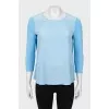 Light blue loose-fitting blouse