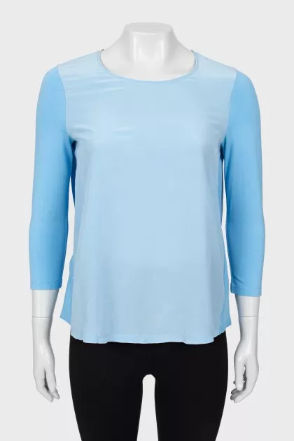 Light blue loose-fitting blouse