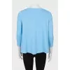 Light blue loose-fitting blouse