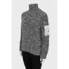 Knitted sweater with pocket on sleeve