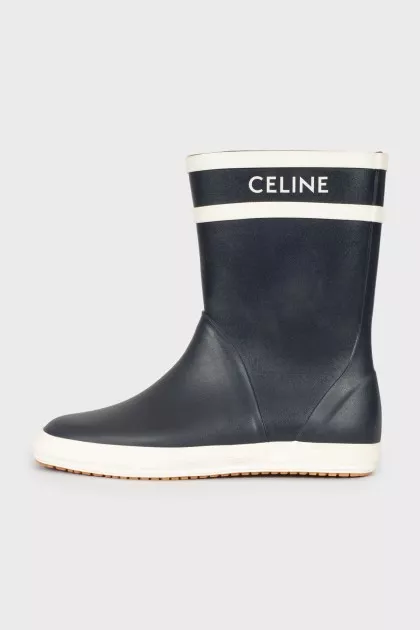Rubber black and white boots
