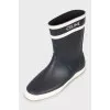 Rubber black and white boots
