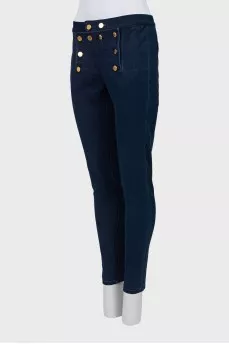 Dark blue jeans with gold buttons