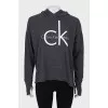 Gray hoodie with brand logo