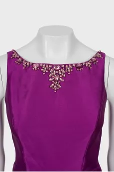 Purple dress decorated with rhinestones
