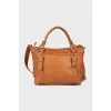 Brown leather bag with keychain
