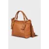 Brown leather bag with keychain