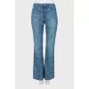 Blue flared jeans with pattern