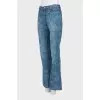 Blue flared jeans with pattern