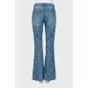 Blue flared jeans with pattern
