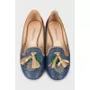 Ballet shoes decorated with embroidery and rhinestones