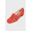 Suede pumps with fringe and logo
