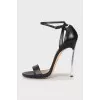 Leather sandals with silver heels