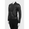 Black leather jacket with silver hardware
