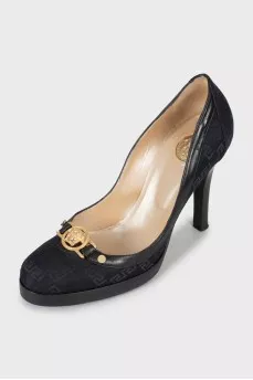 Textile shoes with branded decor