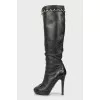 Leather boots with metal decoration