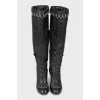 Leather boots with metal decoration