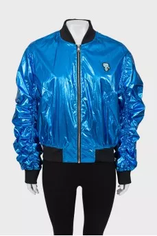 Blue bomber jacket with draped sleeves