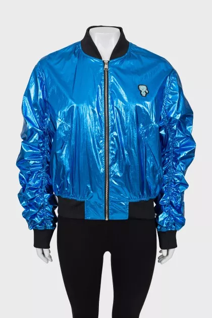 Blue bomber jacket with draped sleeves