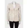 Beige blazer with peak lapels