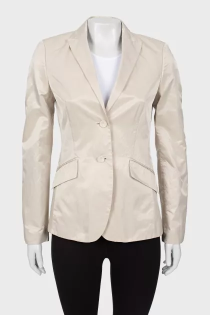 Beige blazer with peak lapels