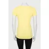 Yellow T-shirt with tag