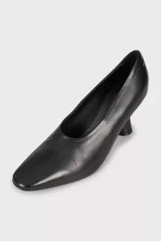 Black shoes with a shaped heel 