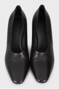 Black shoes with a shaped heel 