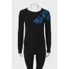 Sweatshirt decorated with embroidery