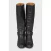 Black leather boots with buckle