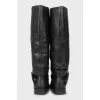 Black leather boots with buckle