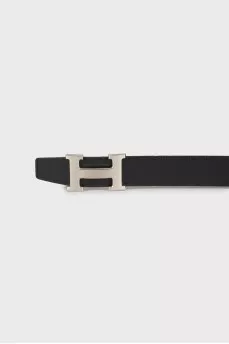 Black leather belt with silver hardware