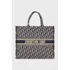 Textile bag in branded print