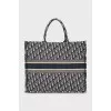 Textile bag in branded print