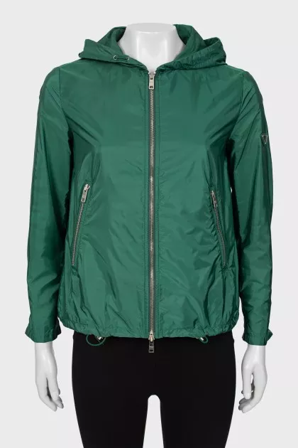 Green windbreaker with silver hardware