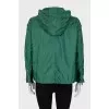 Green windbreaker with silver hardware
