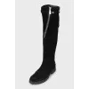 Suede boots decorated with zippers