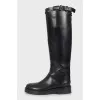 Leather boots decorated with buckle