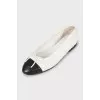 Black and white ballet flats