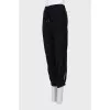 Black trousers decorated with sequins