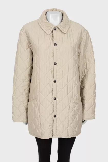 Quilted coat with press-studs closure 