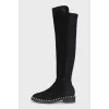 Black boots decorated with pearls