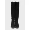 Black boots decorated with pearls