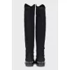 Black boots decorated with pearls