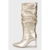 Gold stiletto boots