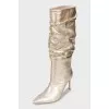 Gold stiletto boots